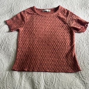 Woman blush pink shirt